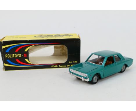 Politoys - A boxed Ford Taunus 20 M.T.S. in green # 519. The model appears in Mint condition. The box is Very Good with light
