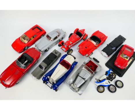 Bburago - Others - An unboxed collection of larger scale diecast model vehicles. Lot includes Bburago Ferrari Testarossa; Mer