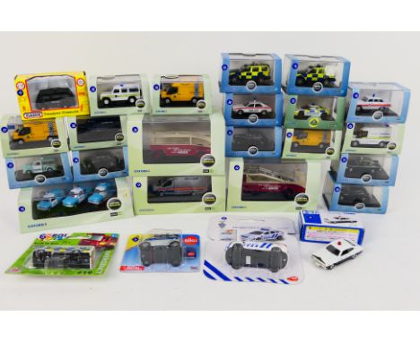 Oxford - Tomica - Corgi - Siku - 25 x boxed / carded vehicles mostly in 1:76 scale including Toyota Corolla Levin in Japanese