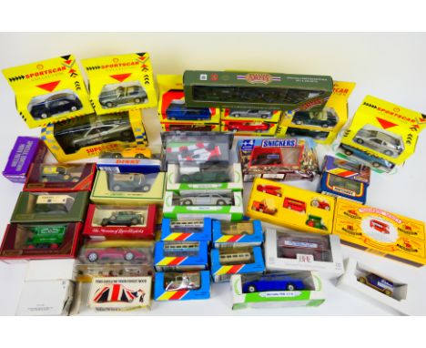 Maisto - Lledo - Matchbox - Corgi - Others - A boxed group of diecast vehicles in several scales. Lot includes Maisto McLaren