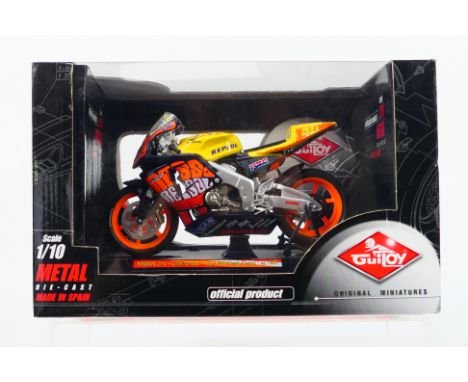 GuiToy - Original Miniatures. A boxed #13699 Honda RC211V, Valentino Rossi, Team Repsol Honda (Cheste) Item appears Mint in b