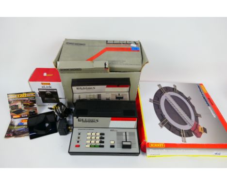 Hornby - Three boxed model railway accessories. Lot comprises of Hornby eLink interface unit  Hornby R950 Zero1 Master Contro