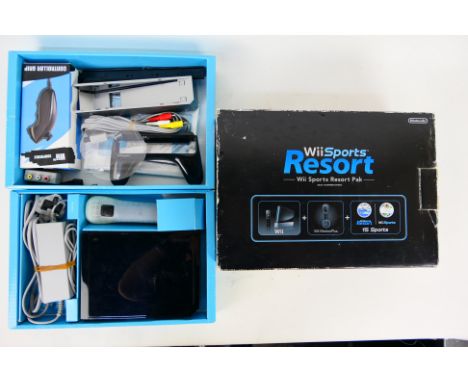 Nintendo - A boxed Nintendo Wii Sports Resort pack. It show signs of light use and appears physically in Good condition with 
