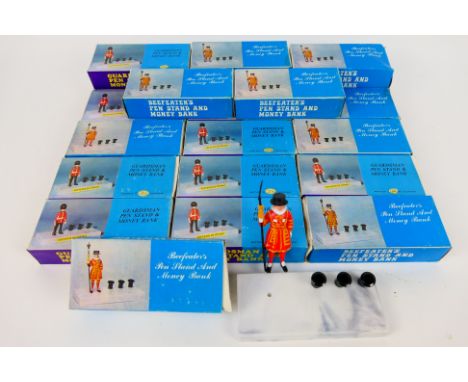 Hong Kong Plastic - A boxed collection of vintage Hong Kong made collectable plastic souvenir pen stands / money banks. Lot c