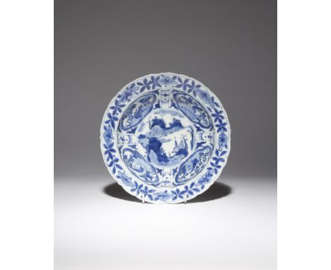 A CHINESE BLUE AND WHITE KRAAK PORCELAIN 'KLAPMUTS' BOWL WANLI 1573-1620 Painted to the centre with a medallion enclosing pag