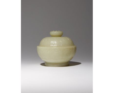 A CHINESE YELLOW JADE 'BAJIXIANG' BOWL AND COVER QING DYNASTY OR LATER Carved as a lotus flowerhead, the petals enclosing the