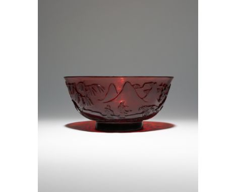 A CHINESE BEIJING RUBY GLASS BOWL QIANLONG 1736-95 The flaring U-shaped body raised on a short spread foot, the translucent r