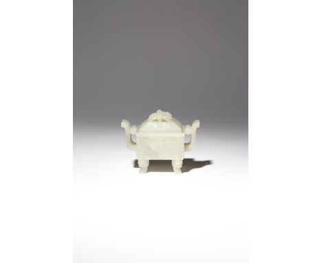 A CHINESE ARCHAISTIC PALE CELADON JADE INCENSE BURNER AND COVER, DING QING DYNASTY The rectangular-section body carved to the