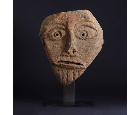 A Celtic sandstone Pagan head,200-300 AD, probably a male subject with distinctive features,14cm wide16cm highProvenance: Lad