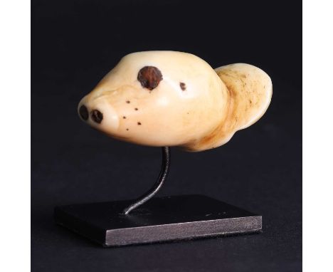 A Yupik Eskimo attachment in the form of a seal head, late 18th/early 19th century, Bering Strait, with baleen inlaid eyes,4.