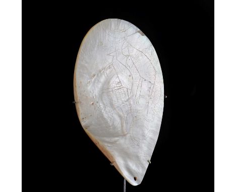 An Aboriginal shell phallocrypt,19th century, North West Australian, with incised decoration,18cm longA phallocrypt is a cere