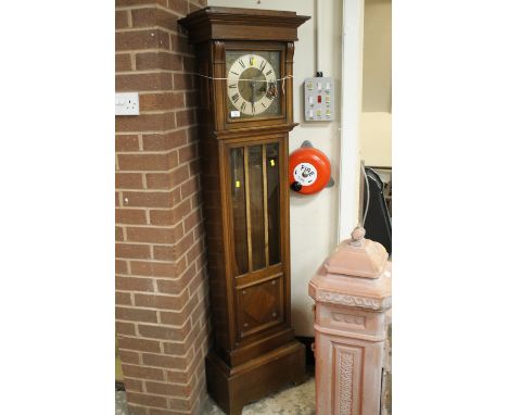 AN OAK CASED MODERN LONGCASE CLOCK