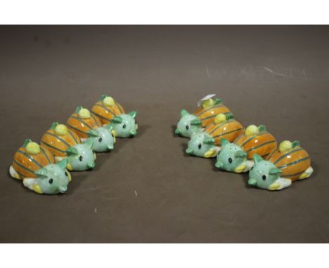 FOUR PAIRS OF CERAMIC SALT AND PEPPER SHAKERS 