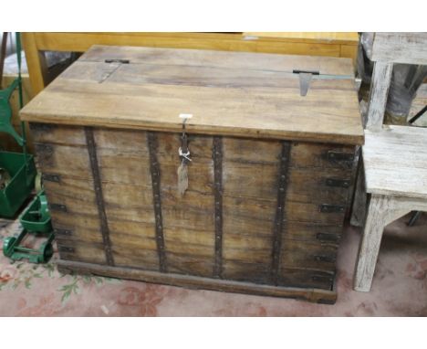 A LARGE COLONIAL STYLE BANDED HARDWOOD TRUNK W 104 CM