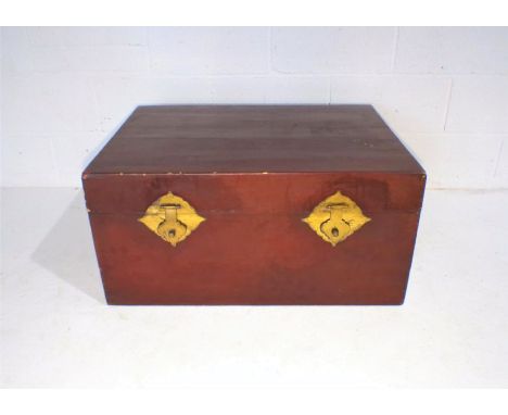 A Chinese lacquered trunk.