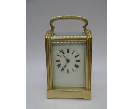 A French carriage clock with dome top