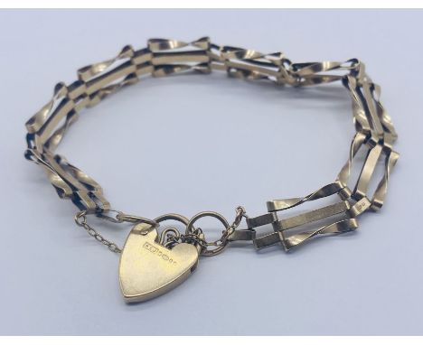 A 9ct gold gate bracelet, weight 7.1g
