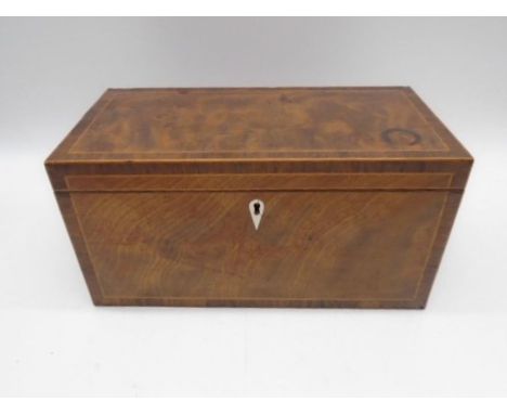 A Georgian inlaid tea caddy