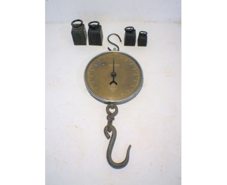A set of 'Salter' scales with a set of 4 weights.