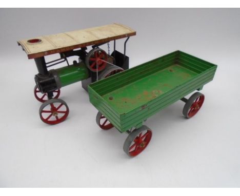 A vintage Mamod steam engine tractor with trailer 