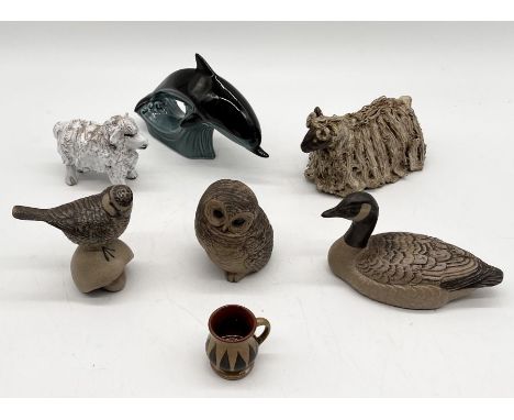 A collection of ceramic animals including three Poole Pottery stoneware pieces, studio pottery sheep etc. 