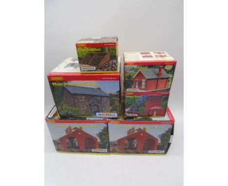 A collection of six boxed Hornby Skaledale OO gauge scale model buildings including Main Station Building (R8628), two Double