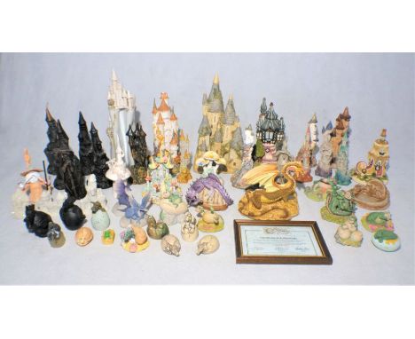 A collection of ceramic castles and dragons, including Lilliput Lane, Dream Dragons, Purewhins Porcelain, Enchantica, Pendrag