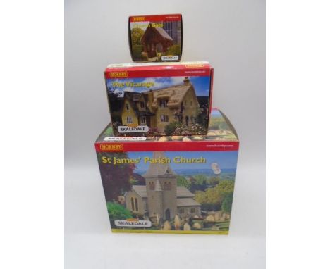 A collection of three boxed Hornby Skaledale OO gauge scale model buildings including St James Parish Church (R8516), The Vic