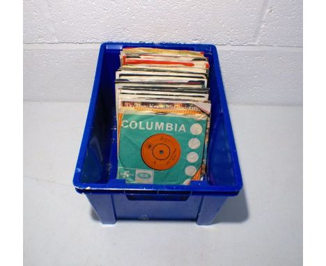 A quantity of 7" vinyl records including Bob Dylan, Adam and the Ants, Elvis Presley, Rainbow, Wham, George Michael, Def Lepp