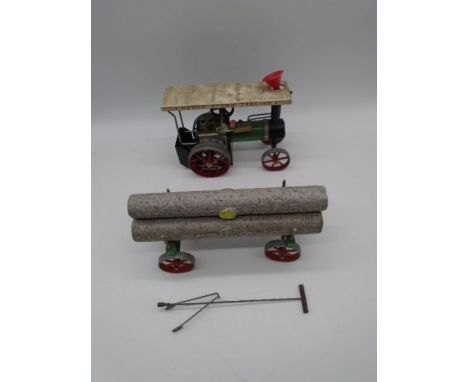 A vintage Mamod steam engine tractor with log trailer 