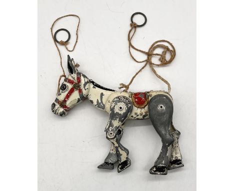 A vintage metal Muffin the Mule puppet