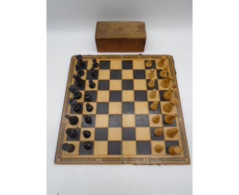A vintage chess set with Chad Valley Games chess and draught board