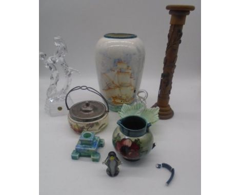 A miscellaneous lot including a wooden candlestick with carved leaf design, a Moorcroft jug (Handle A/F - all pieces present)