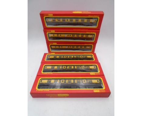 A collection of six boxed Hornby Railways OO gauge Great Western carriages including four composite coaches with seats (R.743