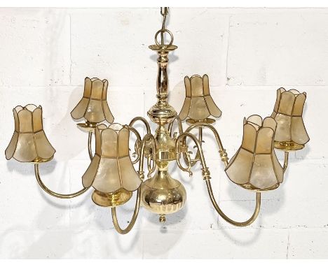 A brass six branch candelabra ceiling light  