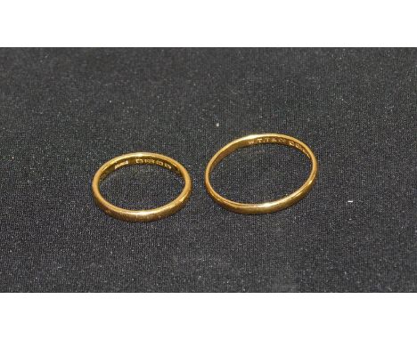 Two 22 carat hallmarked gold wedding rings, sizes K & T, 4.8 gm