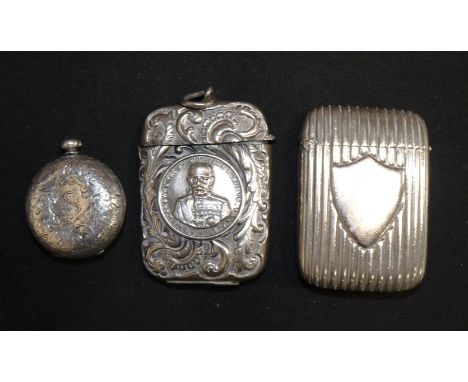 An acanthus embossed Vesta case with round medallion depicting Field Marshall Lord Roberts (unmarked); a ribbed Vesta case wi