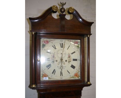 A late 18th century oak and mahogany longcase clock with swan neck pediment and turned columns to the hood, compressed arch, 