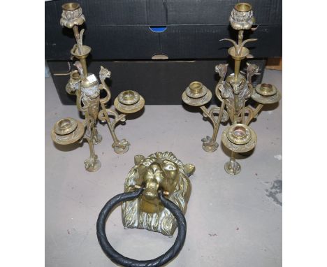 A pair of Victorian aesthetic movement candlesticks of tri-form, 15½"; a large brass lion's head door knocker