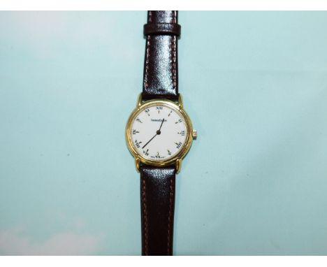 A lady's Jaeger-LeCoultre 'Odysseus' number 427 18 carat hallmarked gold wrist watch with white enamel dial, Roman numerals a