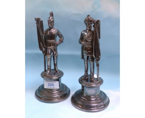 A pair of EPNS table centres in the form of a British and an Indian soldier; a silver pickle fork; 3 other pieces of silver p