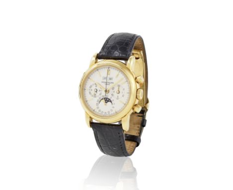 Patek Philippe. A very fine and rare 18K gold perpetual calendar manual wind chronograph wristwatchTrès beau et rare chronogr