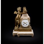 A FRENCH GILT METAL AND MARBLE MANTEL CLOCK IN LOUIS XVI STYLE