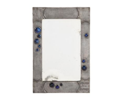 A PEWTER, POSSIBLY TUDRIC, AND ENAMEL BOSSED RECTANGULAR MIRRORCIRCA 1900, POSSIBLY ARCHIBALD KNOX FOR LIBERTYWith dedication