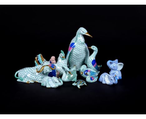 A COLLECTION OF TEN MODERN HEREND MODELS OF ANIMALSIn green and blue scale decoration, comprising a penguin, 17cm high, a hen