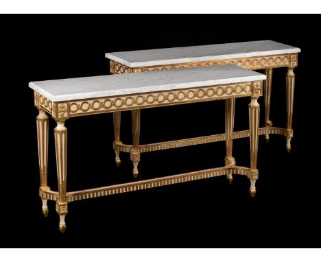 A PAIR OF PAINTED AND PARCEL GILT CONSOLE TABLES IN 19TH CENTURY TASTESECOND HALF 20TH CENTURYEach with a marble top76.5cm hi