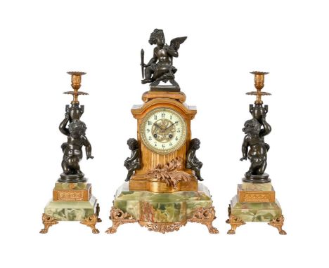 A FRENCH PATINATED METAL FIGURE MOUNTED GILT AND ONYX MANTEL CLOCK GARNITUREUNSIGNED, CIRCA 1900The eight-day countwheel bell