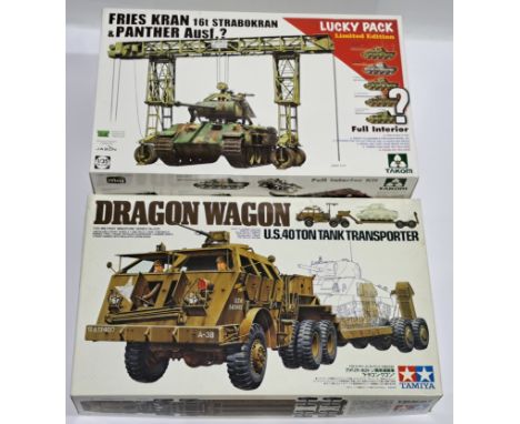 Takom &amp; Tamiya a boxed 1:35 scale military vehicle pair. Conditions appear Excellent (parts bagged includes instructions)