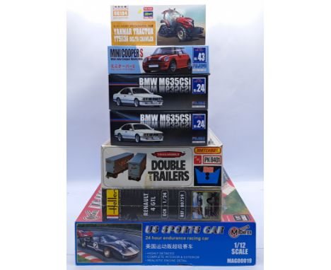 Matchbox, Hasagawa, Fujimi and similar a boxed mixed scale car and commercial vehicle model kit group. Conditions appear Exce