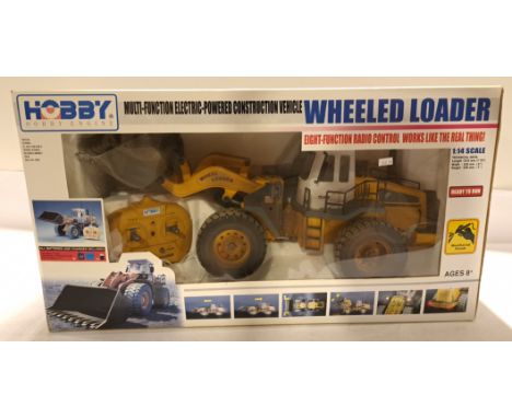 Hobby Engine, a boxed 1:14 Scale Wheeled Loader RC Vehicle. Unchecked for completeness or if in working order condition appea